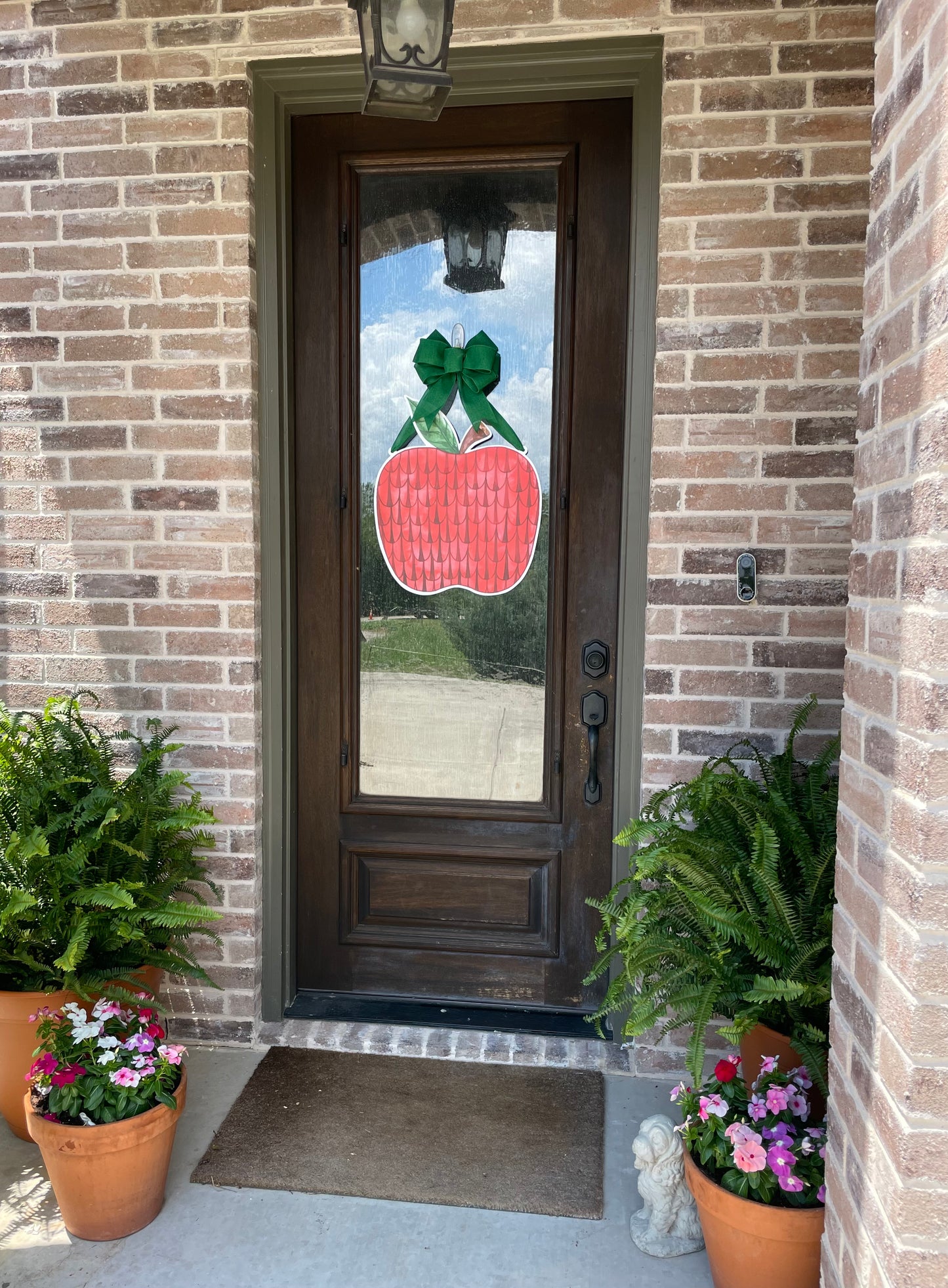 The Big Red Apple Door Sign